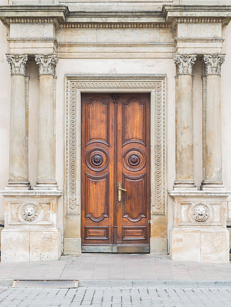 Ancient decorative classic gate with wooden door