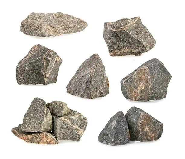 Photo of Granite stones, rocks set isolated on white background