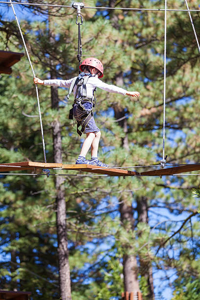 istock kid in adventure park 497903972