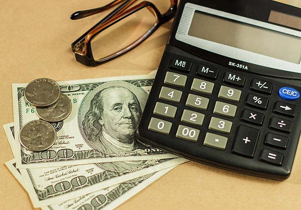 istock Image of money and a calculator, home budget 497905158