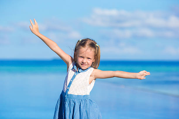 istock Adorable little girl during beach vacation having fun 497905250