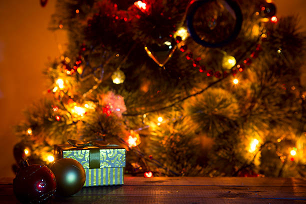 istock Christmas holiday background with empty wooden deck table over bokeh. 497905706