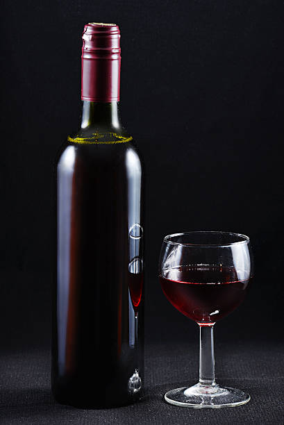 istock Bottle and a glass of red wine 497906734