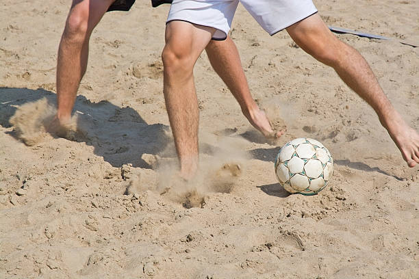 istock Beach soccer and ball 497936196