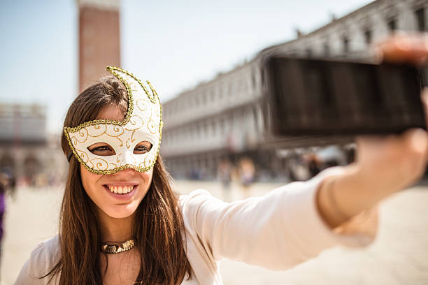istock venetian woman for carnival in venice 497936334