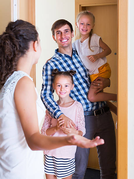 istock Hospitable householder meeting expected guests 497937660