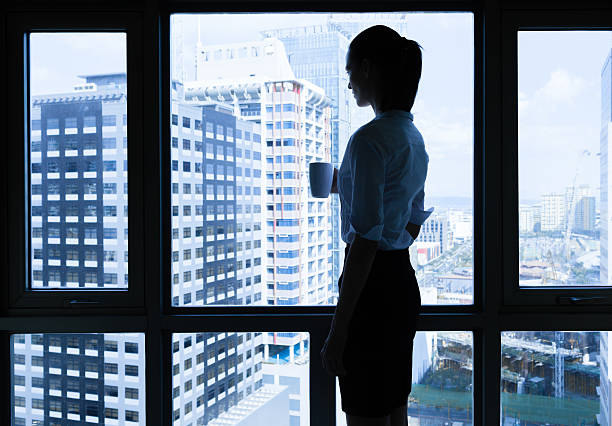 istock Woman drinking coffee in the office 497939738