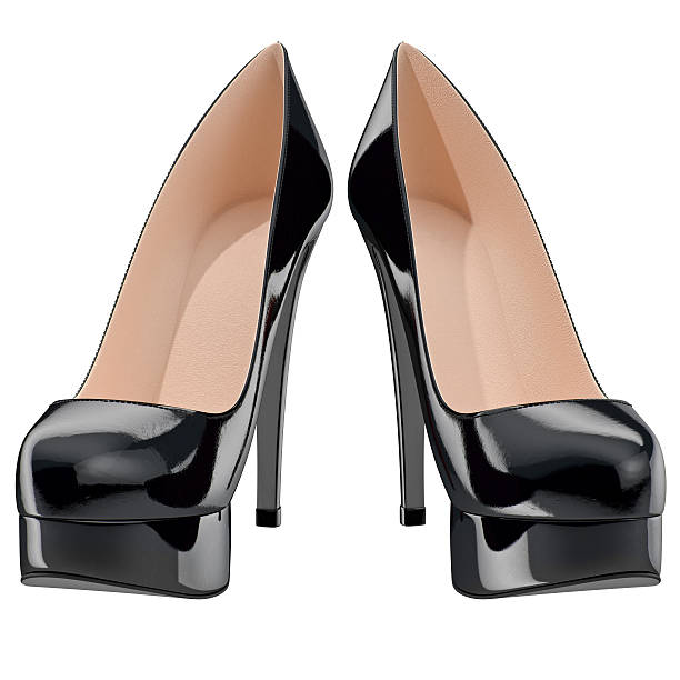 istock Woman's black patent leather shoes on high heels, front view 497940648