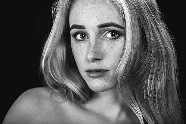 istock woman with freckles 497941830