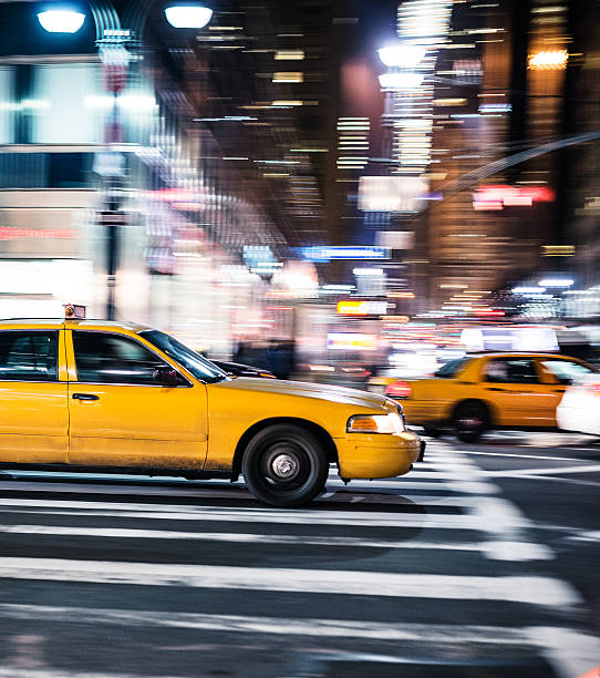 istock taxi running fast on nyc 497942168
