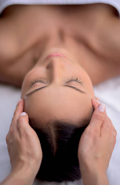istock Woman getting a facial at the spa 497946808