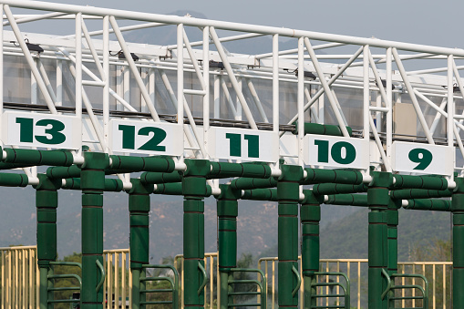 Close-up of the horse racing starting gate. 