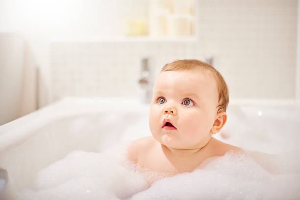 istock Baby boy sat in the bath 497947094