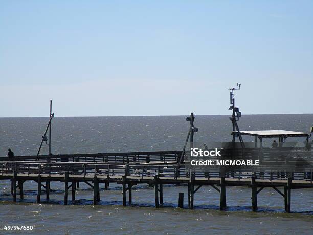 Fishing Pier At Cedar Point Stock Photo - Download Image Now - 2015, Alabama - US State, Bay of Water