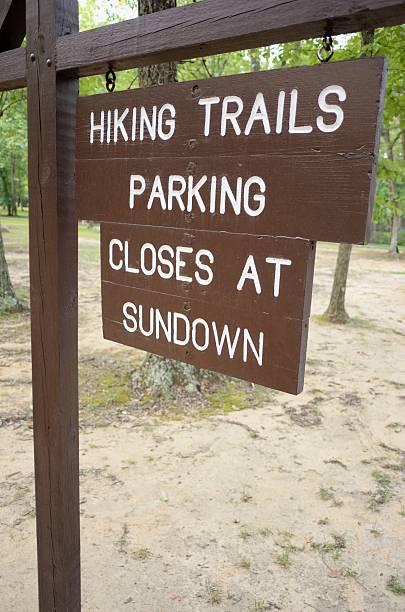 istock Hiking trails parking closes at sundown sign 497947902