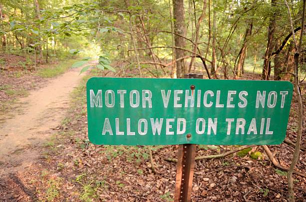 istock Motor vehicles no allowed on trail sign 497947952