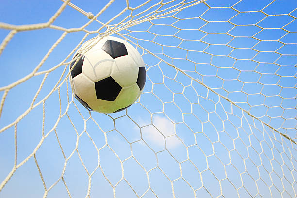 istock soccer ball in goal 497950767
