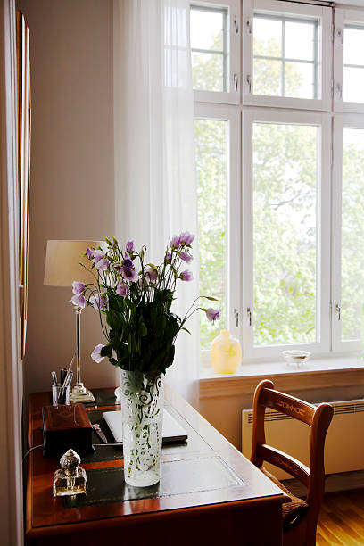 A Sunlight pouring through a bedroom bay window in an English country house in Worcestershire