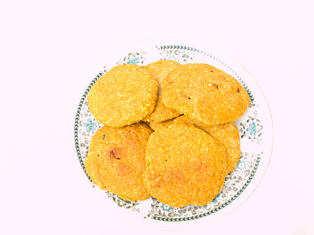 istock cookies on a Chinese porcelane plate isolated on white background 497952057
