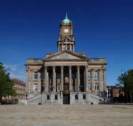 Birkenhead Town Hall is a town hall and former civic building in Birkenhead, on the Wirral Peninsula, England. The building was the former administrative headquarters of the County Borough of Birkenhead, and more recently, council offices for the Metropolitan Borough of Wirral. Birkenhead Town Hall remains the location of the town's register office. Building was designed by local architect Charles Ellison in 1882.