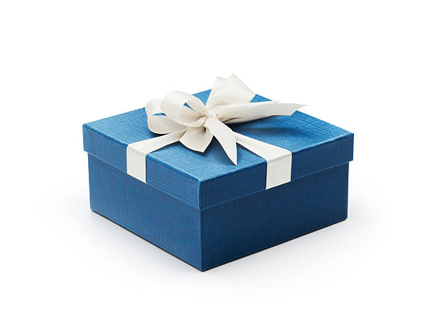 Blue gift box with white bow Blue gift box with white bow isolated on white wrap dress stock pictures, royalty-free photos & images
