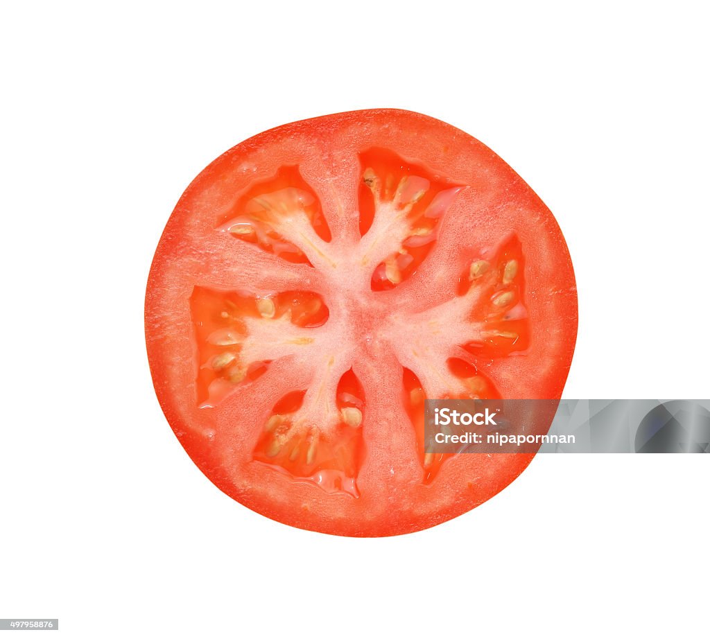 Tomato slice isolated on white background Slice of Food Stock Photo