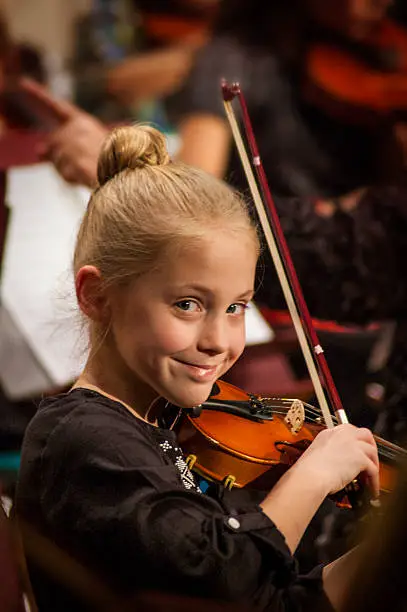 Photo of Girl Playing the Violin