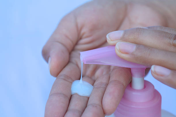 istock Foaming hand soap for washing close up 497960516