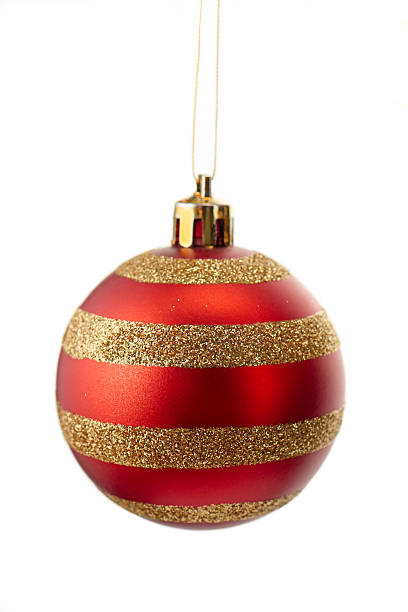 istock Sparkly gold and red striped christmas ball 497961530