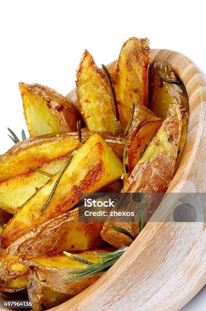 Roasted Potato Wedges Stock Photo - Download Image Now - 2015, Appetizer, Bowl