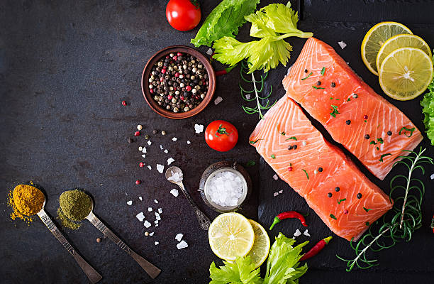 istock Raw salmon fillet and ingredients for cooking 497964732