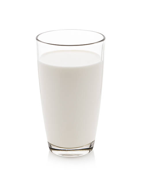 istock Glass of milk isolated on white 497967962