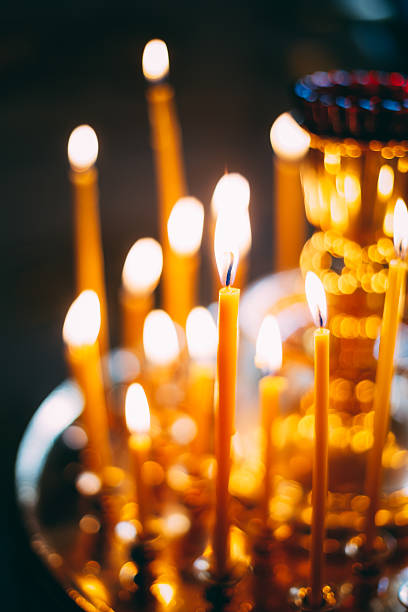 istock Church candles at dark background 497969258