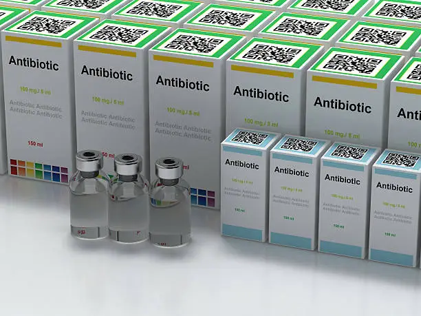 Medicine boxes with text antibiotic and vials on white background, 3d render.