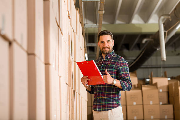 istock Young Businessman in Factory 497971374