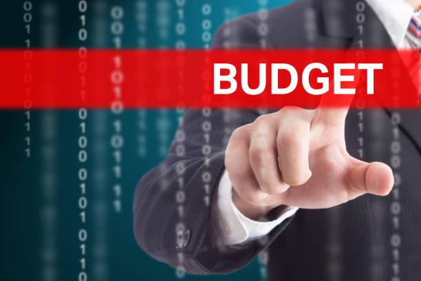 istock Businessman touching Budget 497981550