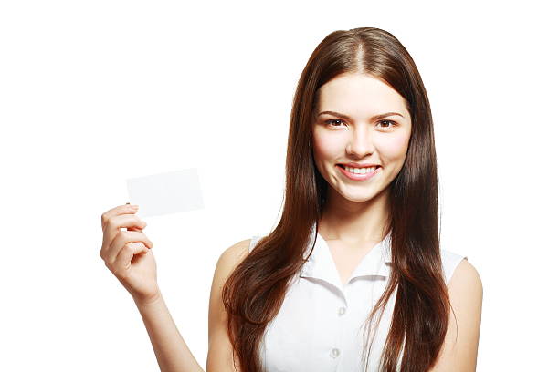 istock woman holds out a card 497982368