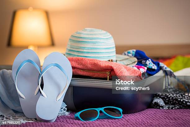 Open Suitcase On Bed Stock Photo - Download Image Now - Packing, Suitcase, Vacations