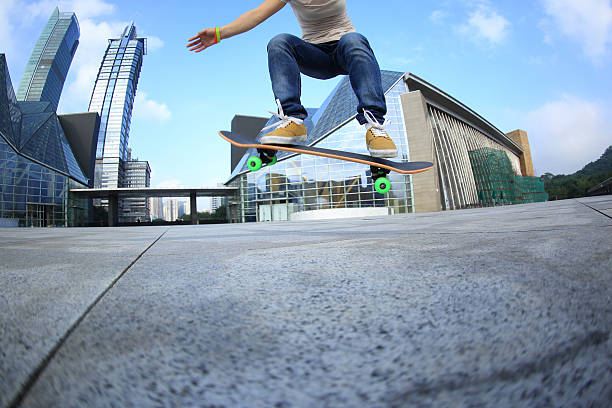 istock skateboarder skateboarding at  city 497986322