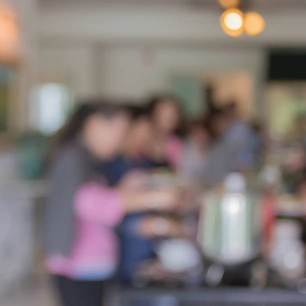 istock blur customer picking food in dining room 497991910