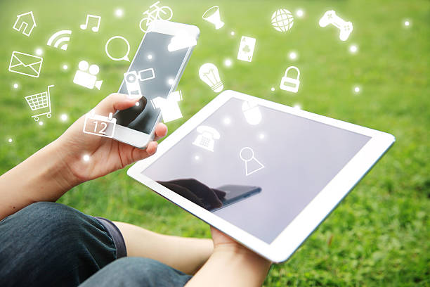 istock Woman with tablet at the park 497991948
