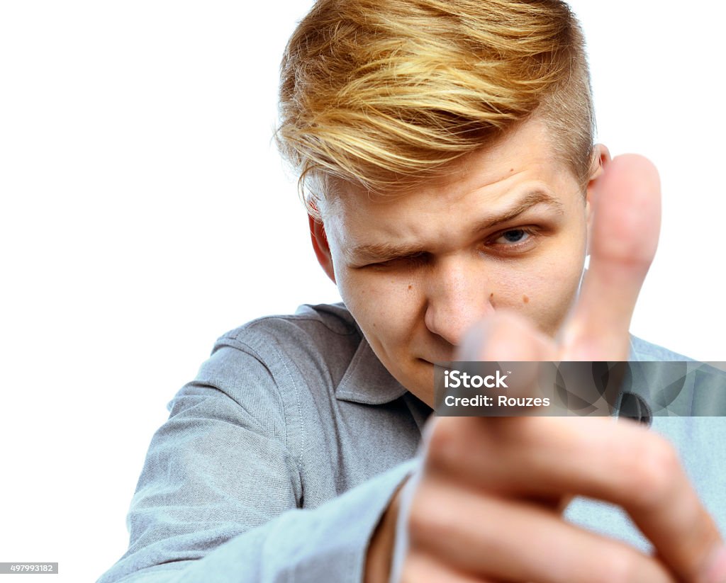 It's your time Portrait of laughing young man pointing at the camera.  20-24 Years Stock Photo