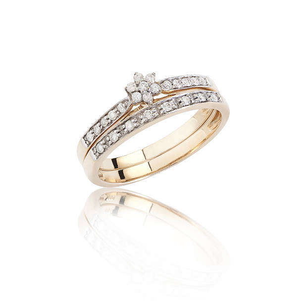 istock Diamonds ring on golden body shape isolated 497996923