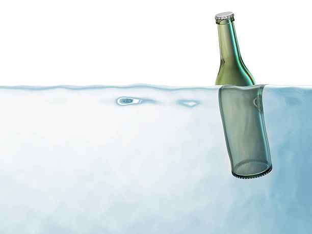 istock Bottle of Beer in Water isolated on white background 497997237