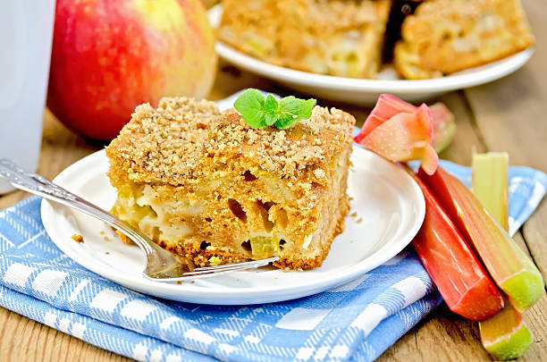Pie with rhubarb and apples on the board