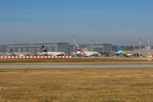 Hamburg, Germany - March 10, 2014: Airbus A380 Airplanes for Qatar, Lufthansa, Emirates and Korean Air in different development stages on the Airbus Plant in Hamburg Finkenwerder