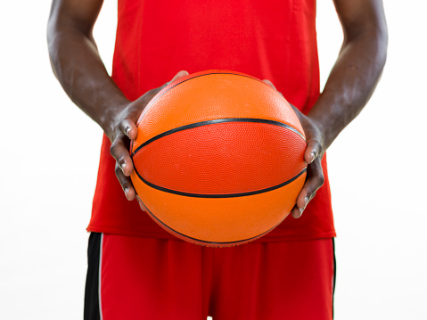 Basketball player on white background.