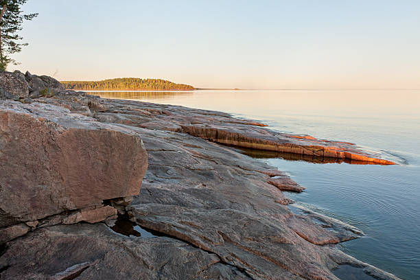 istock View on Onega Lake granite shore at midnight sun 498015337