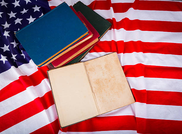 istock Vintage open book on American flag 498015869