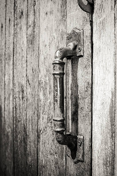 istock Door handle on old wooden door 498016233